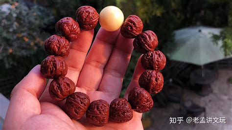 桃核手串怎么盤紅,桃核手串怎么盤紅得快縮略圖